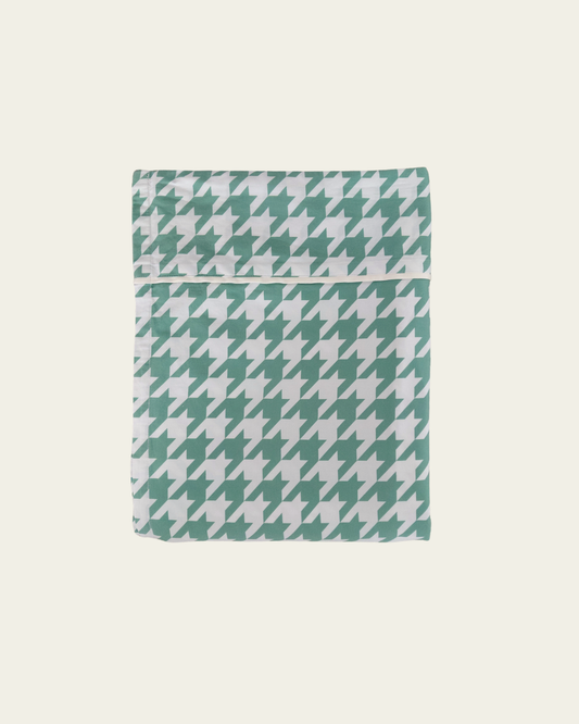 Green pea houndstooth patterned cotton flat sheet in pea green and white product shot 